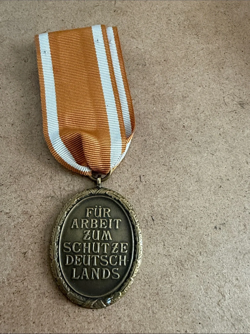Vintage Military West Wall Bronze Medal with Orange and White Ribbon